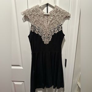 Ladies dress with lace style detail